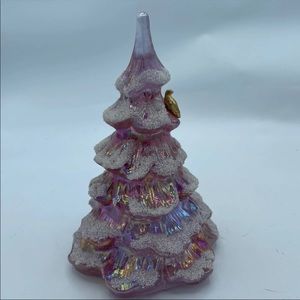 Fenton pink iridescent tree with a gold bird. Frosted snow.